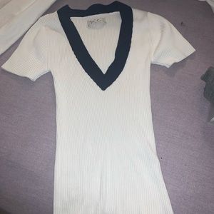 Urban outfitters tight white top with blue collar.